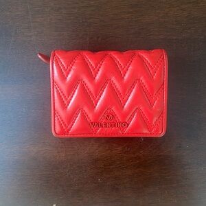 Valentino wallet, good condition. Color is most like the first picture